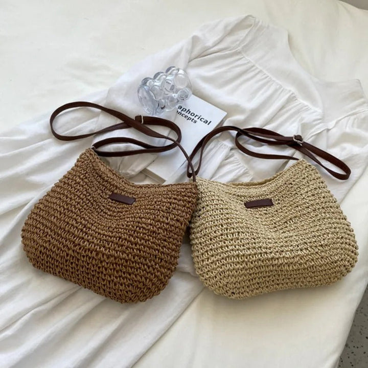 AMINA - Geflochtene Strohtasche mit verstellbarem Lederhenkel
